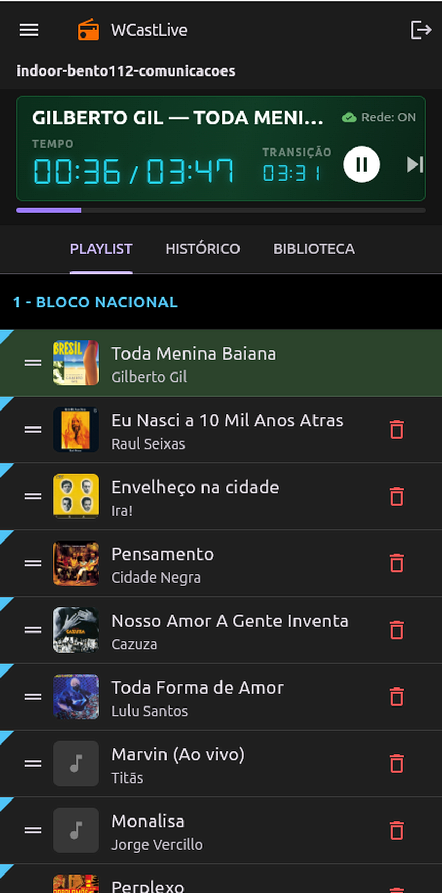 App WCastLive Indoor tocando a playlist do dia, com visor de tempo e transição
